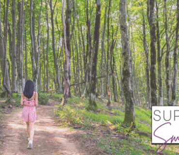 Women walking through the forest - aim being to portray a summer break!
