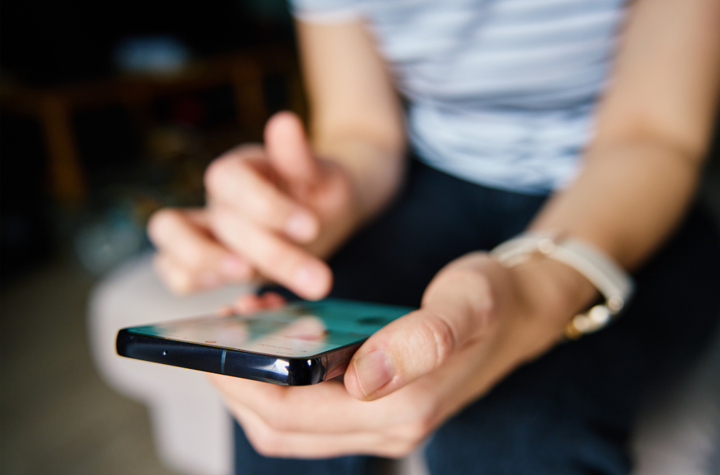 socialmedia Image of someone holding a phone.