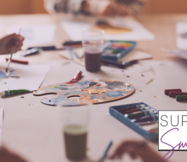 Blog Headers (6) Image of a table featuring art supplies