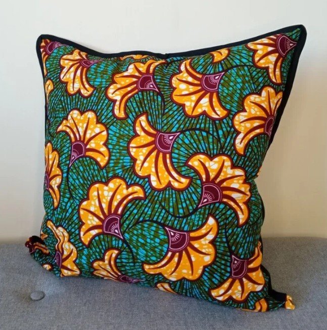 Image of cushion with African print design by Ile Darasimi